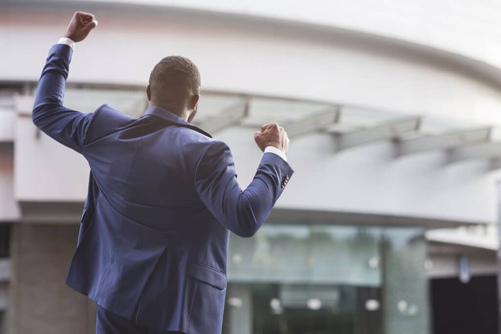 american job seeker celebrating successful interview